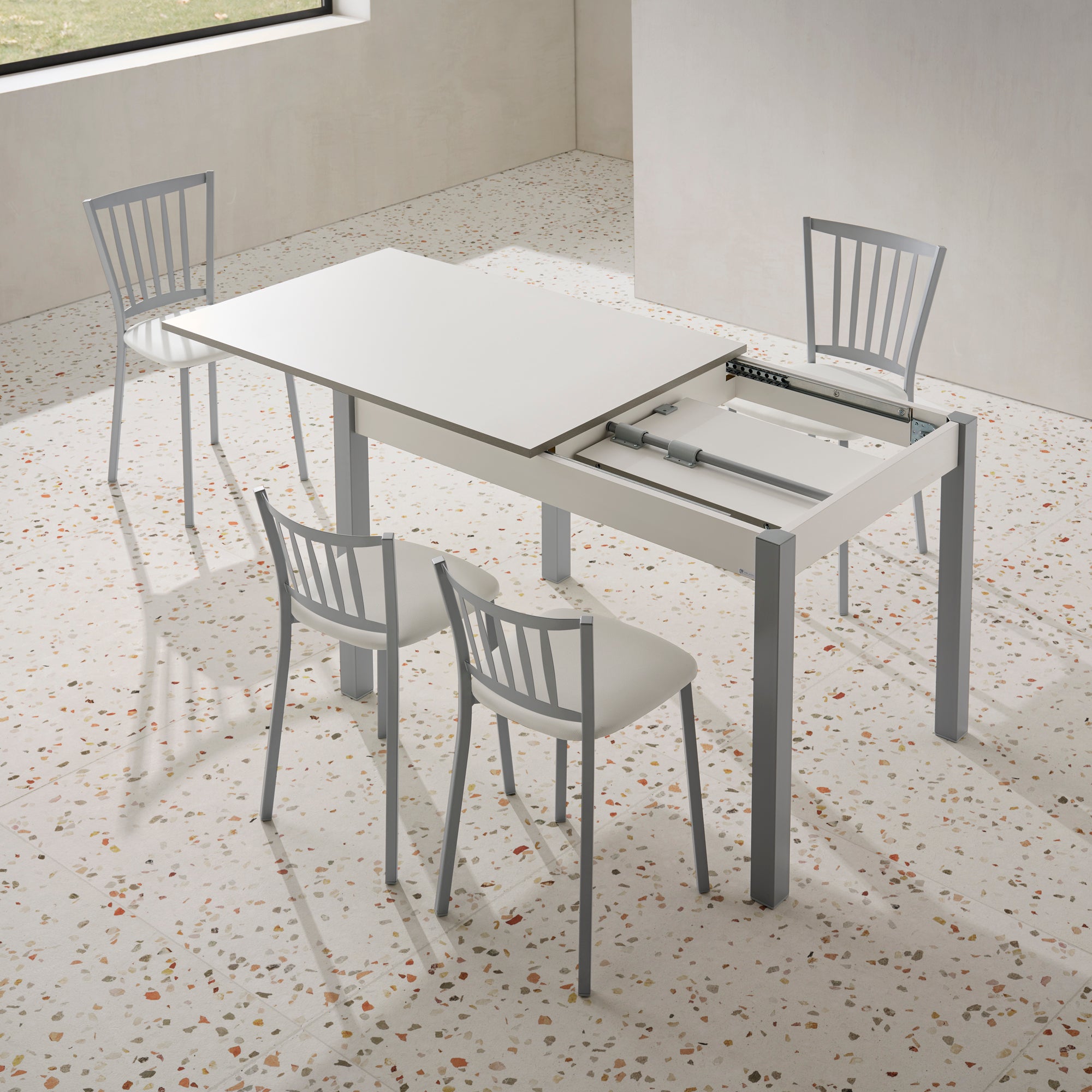 V VELASCO Mesa de Cocina Extensible Arona | Mesa de Comedor Rectangular 100x60 cm a 140x60 cm | Encimera Blanca con Armazón y Patas Metálicas de Color Aluminio, Diseño Moderno para Espacios Pequeños